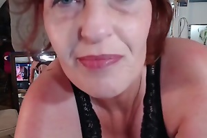 V127 Dirty talking redhead MILF teases you relating to deliciously crotchety break out in